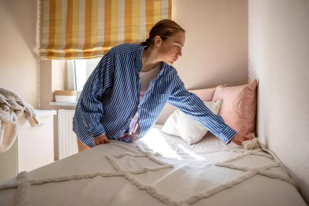 A comfortable yet stylish man's outfit after prostate surgery, featuring soft, breathable fabrics that provide support and ease of movement. In the foreground, a pair of loose-fitting, drawstring waist pants in a neutral, soothing color like heather gray. The middle ground showcases a button-down shirt in a subtly textured, natural material like organic cotton, with a relaxed, open collar. The background shows a plush, oversized cardigan or robe in a cozy, muted tone, providing additional warmth and comfort. The lighting is soft and diffused, creating a calming, therapeutic atmosphere. The camera angle is slightly elevated, capturing the ensemble from a slightly above perspective, conveying a sense of ease and care. A comfortable yet stylish man's outfit after prostate surgery, featuring soft, breathable fabrics that provide support and ease of movement. In the foreground, a pair of loose-fitting, drawstring waist pants in a neutral, soothing color like heather gray. The middle ground showcases a button-down shirt in a subtly textured, natural material like organic cotton, with a relaxed, open collar. The background shows a plush, oversized cardigan or robe in a cozy, muted tone, providing additional warmth and comfort. The lighting is soft and diffused, creating a calming, therapeutic atmosphere. The camera angle is slightly elevated, capturing the ensemble from a slightly above perspective, conveying a sense of ease and care.