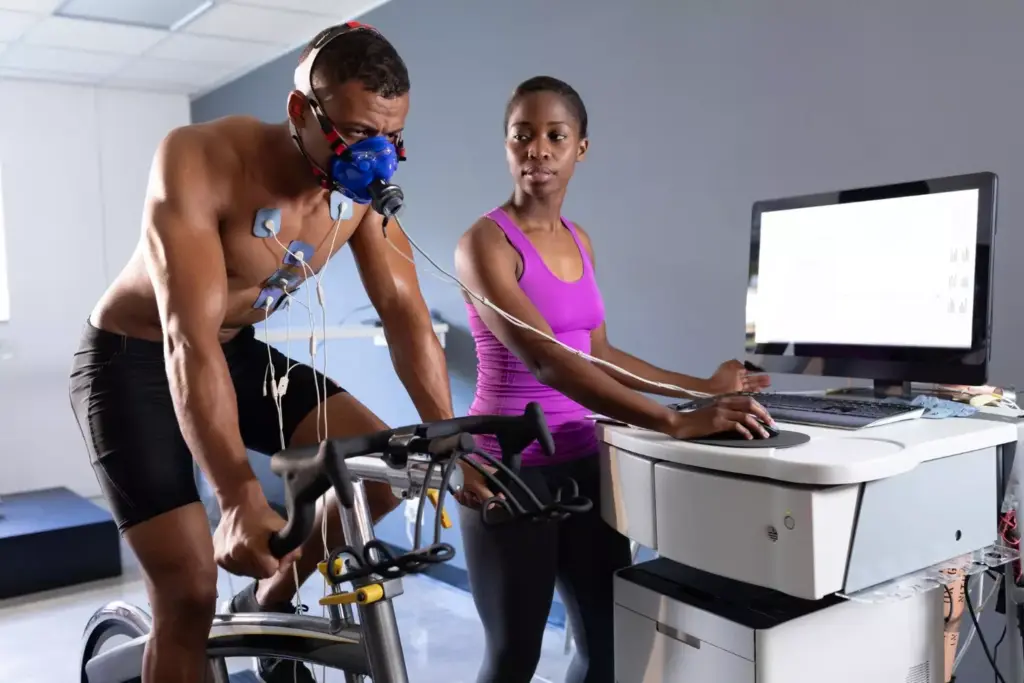 A contemporary sports medicine clinic, with an athlete undergoing a comprehensive ACL rehabilitation program. In the foreground, a physiotherapist guides the patient through targeted exercises on a specialized training platform, their movements captured by high-speed cameras. The middle ground features a mix of medical equipment, including an isokinetic dynamometer and a 3D motion capture system, all designed to monitor and optimize the recovery process. The background showcases a state-of-the-art gymnasium, outfitted with advanced strength training apparatus and a running track, where the patient will gradually progress towards a safe return to their chosen sport. Soft, diffused lighting and clean, modern aesthetics create an atmosphere of scientific precision and evidence-based care.