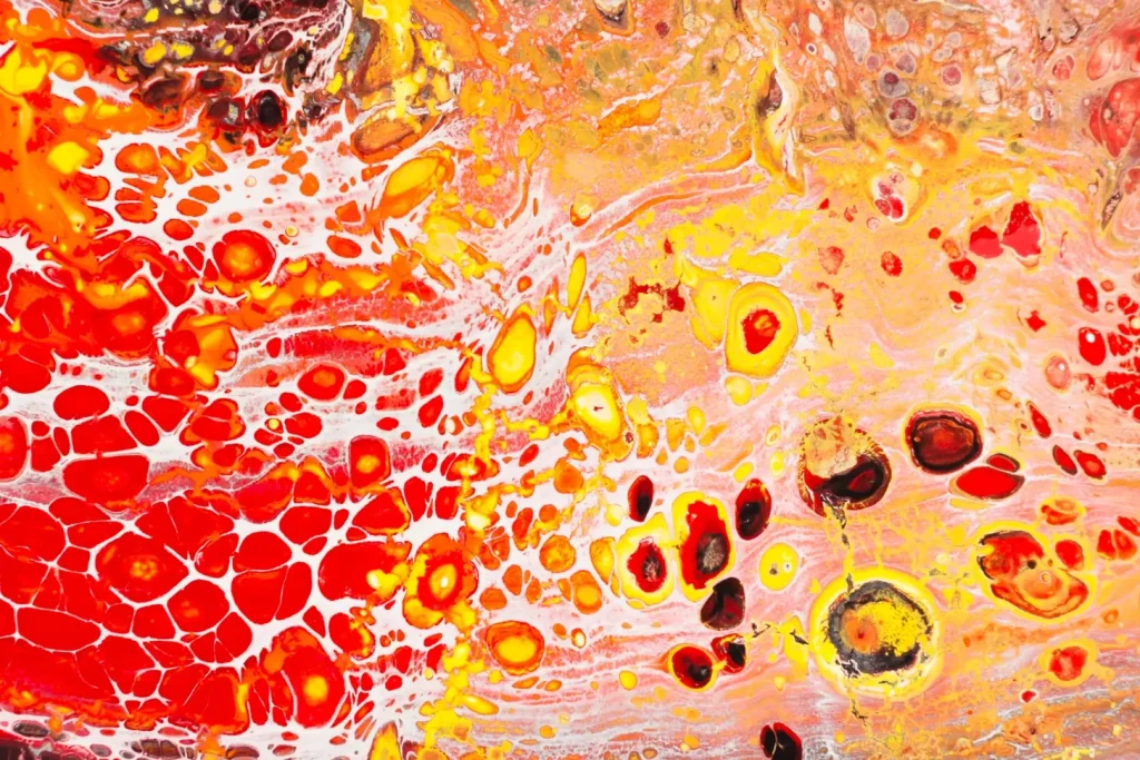 A cross-section of the human femur, revealing the intricate network of bone marrow. Glowing reddish-orange hues illuminate the regenerative process, where hematopoietic stem cells divide and differentiate to replenish the essential blood and immune cells. The detailed, high-resolution image captures the microscopic details of the bone matrix and the dynamic activity of the bone marrow niche, conveying the natural, organic rhythm of this vital biological renewal. Soft, diffused lighting casts subtle shadows, creating depth and dimensionality, while a cool, clinical color palette suggests the scientific nature of the subject matter. Rendered with photographic realism, this image visually conveys the gradual yet steady regeneration of bone marrow.