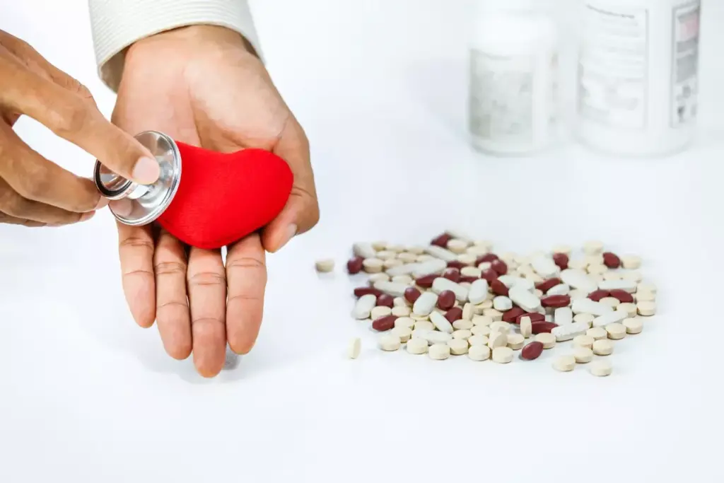 A detailed illustration of essential acute myocardial infarction medications. In the foreground, an array of pharmaceuticals - pills, capsules, and vials - arranged with precision, each representing a specific drug used to treat heart attacks. In the middle ground, a cutaway view of the human heart, with the damaged myocardium highlighted, showcasing the direct impact of these medications. The background is a softly lit, clinical setting, conveying the urgency and importance of these treatments. The lighting is crisp and directional, casting subtle shadows that emphasize the three-dimensional nature of the scene. The overall tone is one of medical expertise and lifesaving purpose, inviting the viewer to appreciate the vital role these medications play in acute myocardial infarction care. A detailed illustration of essential acute myocardial infarction medications. In the foreground, an array of pharmaceuticals - pills, capsules, and vials - arranged with precision, each representing a specific drug used to treat heart attacks. In the middle ground, a cutaway view of the human heart, with the damaged myocardium highlighted, showcasing the direct impact of these medications. The background is a softly lit, clinical setting, conveying the urgency and importance of these treatments. The lighting is crisp and directional, casting subtle shadows that emphasize the three-dimensional nature of the scene. The overall tone is one of medical expertise and lifesaving purpose, inviting the viewer to appreciate the vital role these medications play in acute myocardial infarction care.