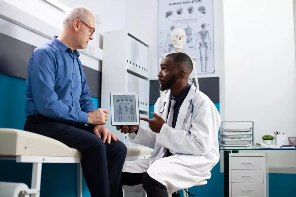 A doctor talking to a patient