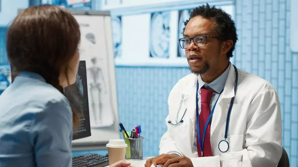 A doctor talking to a patient