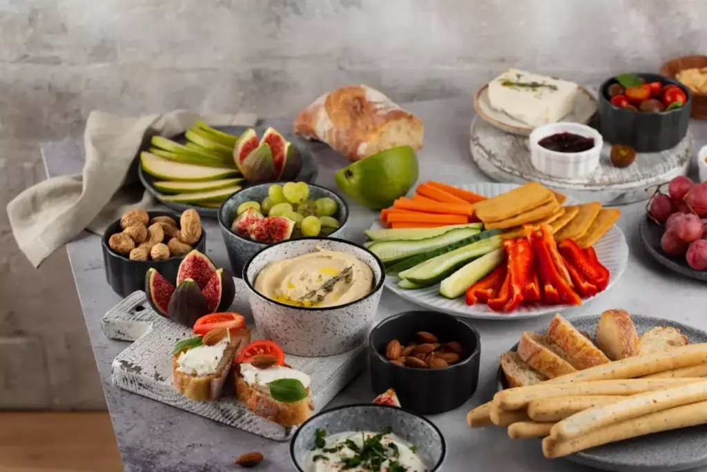 A nourishing spread of whole, nutrient-dense foods arranged on a wooden table, illuminated by warm, natural lighting. In the foreground, a plate showcases a variety of colorful fruits, vegetables, and lean protein sources, such as grilled chicken or fish, to represent a post-prostatectomy diet focused on promoting healing and recovery. The middle ground features a glass of water and a selection of nuts and seeds, highlighting the importance of hydration and nutrient-rich snacks. The background subtly suggests a serene, tranquil setting, emphasizing the calming and restorative atmosphere during this critical stage of post-surgery healing. A nourishing spread of whole, nutrient-dense foods arranged on a wooden table, illuminated by warm, natural lighting. In the foreground, a plate showcases a variety of colorful fruits, vegetables, and lean protein sources, such as grilled chicken or fish, to represent a post-prostatectomy diet focused on promoting healing and recovery. The middle ground features a glass of water and a selection of nuts and seeds, highlighting the importance of hydration and nutrient-rich snacks. The background subtly suggests a serene, tranquil setting, emphasizing the calming and restorative atmosphere during this critical stage of post-surgery healing.