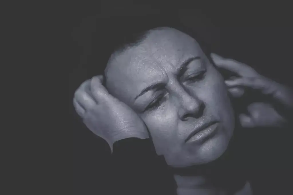 A pensive figure stands in a dimly lit room, their expression conveying the cognitive impact of glioblastoma. The background is hazy, with faint shadows and muted tones, reflecting the cognitive challenges faced. Diffused lighting casts a somber, introspective atmosphere, as the subject appears lost in thought, grappling with the memory loss and cognitive impairments associated with this aggressive brain tumor. The composition is tightly framed, focusing on the contemplative pose and the pained yet determined expression, conveying the profound effect of glioblastoma on an individual's mental faculties. A pensive figure stands in a dimly lit room, their expression conveying the cognitive impact of glioblastoma. The background is hazy, with faint shadows and muted tones, reflecting the cognitive challenges faced. Diffused lighting casts a somber, introspective atmosphere, as the subject appears lost in thought, grappling with the memory loss and cognitive impairments associated with this aggressive brain tumor. The composition is tightly framed, focusing on the contemplative pose and the pained yet determined expression, conveying the profound effect of glioblastoma on an individual's mental faculties.