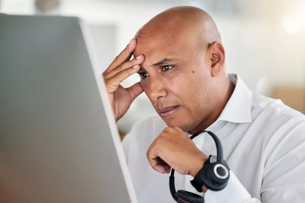 A weary figure, their head bowed, shoulders slumped, sits in a dimly lit room. The lighting casts long shadows, creating a sense of heaviness and fatigue. The background is blurred, with muted tones of gray and blue, emphasizing the central figure's struggle. Soft, diffused light illuminates the person's face, revealing a pensive, exhausted expression. The image conveys the physical and emotional toll of a brain tumor, the burden of the condition weighing heavily on the subject. A weary figure, their head bowed, shoulders slumped, sits in a dimly lit room. The lighting casts long shadows, creating a sense of heaviness and fatigue. The background is blurred, with muted tones of gray and blue, emphasizing the central figure's struggle. Soft, diffused light illuminates the person's face, revealing a pensive, exhausted expression. The image conveys the physical and emotional toll of a brain tumor, the burden of the condition weighing heavily on the subject.