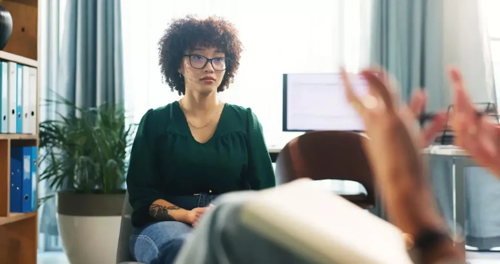 Hands therapist and talk to person for counseling session medical advice and assessment notes patient listen and psychologist with guidance evaluation chat and information for recovery treatment