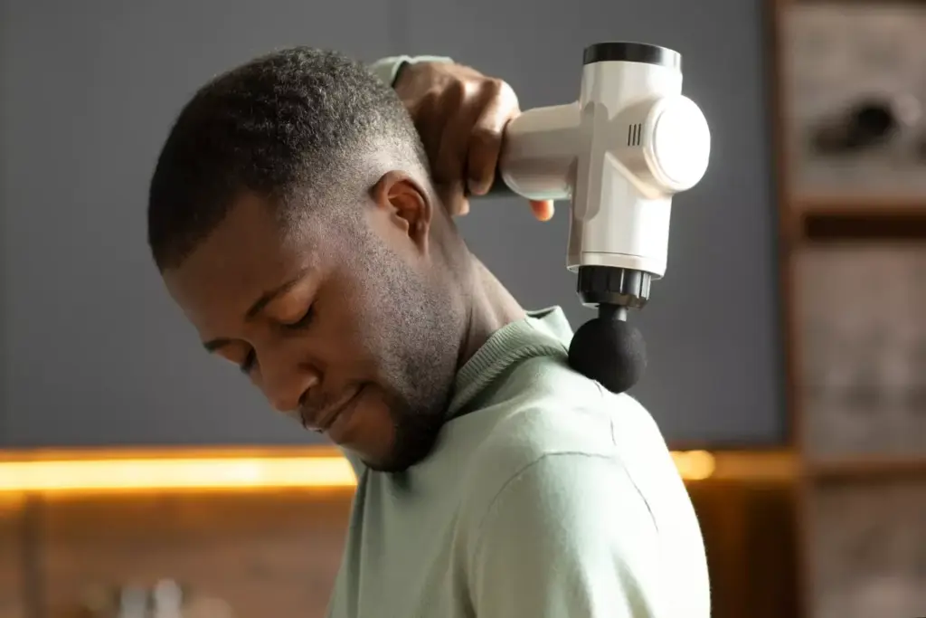 Neck and shoulder tension relief: A serene scene of a person in a peaceful state, their head tilted back with eyes closed, shoulders relaxed and muscles visibly unwound. Warm, soft lighting illuminates the figure, creating a calming atmosphere. The background is blurred, allowing the focus to remain on the subject's upper body, highlighting the release of tension and stress. The composition emphasizes the transition from strain to tranquility, conveying a sense of restorative calm and rejuvenation. Neck and shoulder tension relief: A serene scene of a person in a peaceful state, their head tilted back with eyes closed, shoulders relaxed and muscles visibly unwound. Warm, soft lighting illuminates the figure, creating a calming atmosphere. The background is blurred, allowing the focus to remain on the subject's upper body, highlighting the release of tension and stress. The composition emphasizes the transition from strain to tranquility, conveying a sense of restorative calm and rejuvenation.