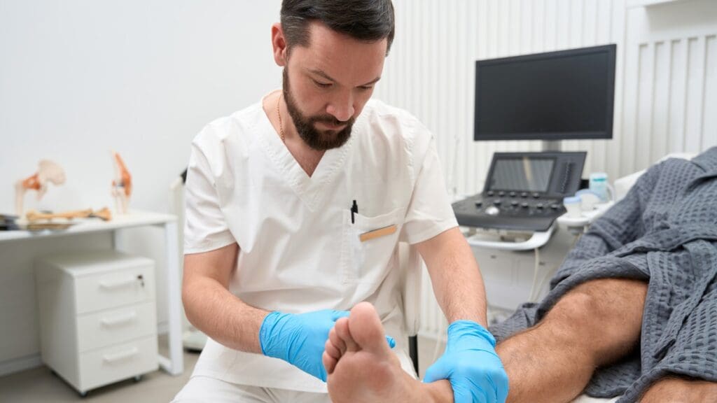 doctor examining foot doctor examining foot